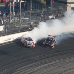 Patrick Mordaunt (white Lexus SC430) and Chelsea Denofa (black Mazda RX-8)