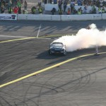 Daigo filling the cockpit with tire smoke in the infield