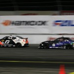 Fredric Aasbo (white Scion tc) and Robbie Noshida (black Achilles Lexus SC) taking off from the starting line