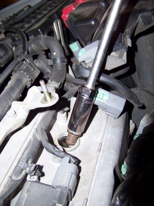 Removing Spark Plug from cylinder head Nissan Maxima/Infiniti I30