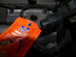 Applying Di-electric Grease to Ignition Coil Nissan Maxima/Infiniti I30