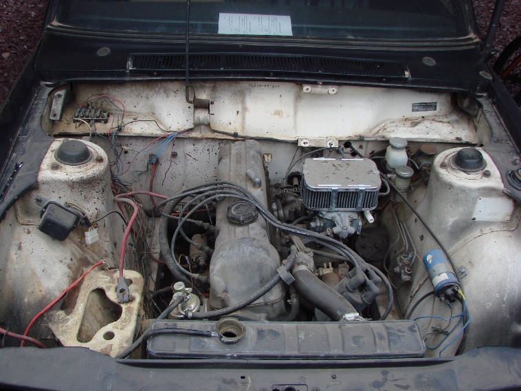 Datsun 510 engine bay before