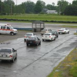 Cars lined up at the pit entrance